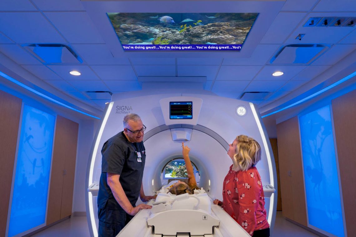 Caring MR Suite® featuring 4K Ceiling Video Display, In-Bore Viewing, Scrolling Text + MRI LED Lighting for your best MRI experience
