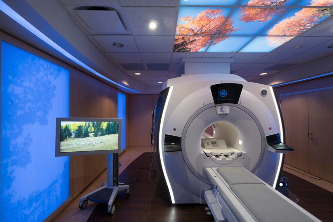 Intermountain Cedar City Caring MR Suite® featuring MRI in-bore viewing + custom LED Illuminated Image Ceiling®, Illuminated Wall Fixtures + Nature Theme videos for your best MRI experience
